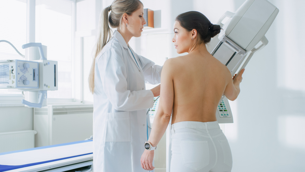 woman getting a breast cancer screening.