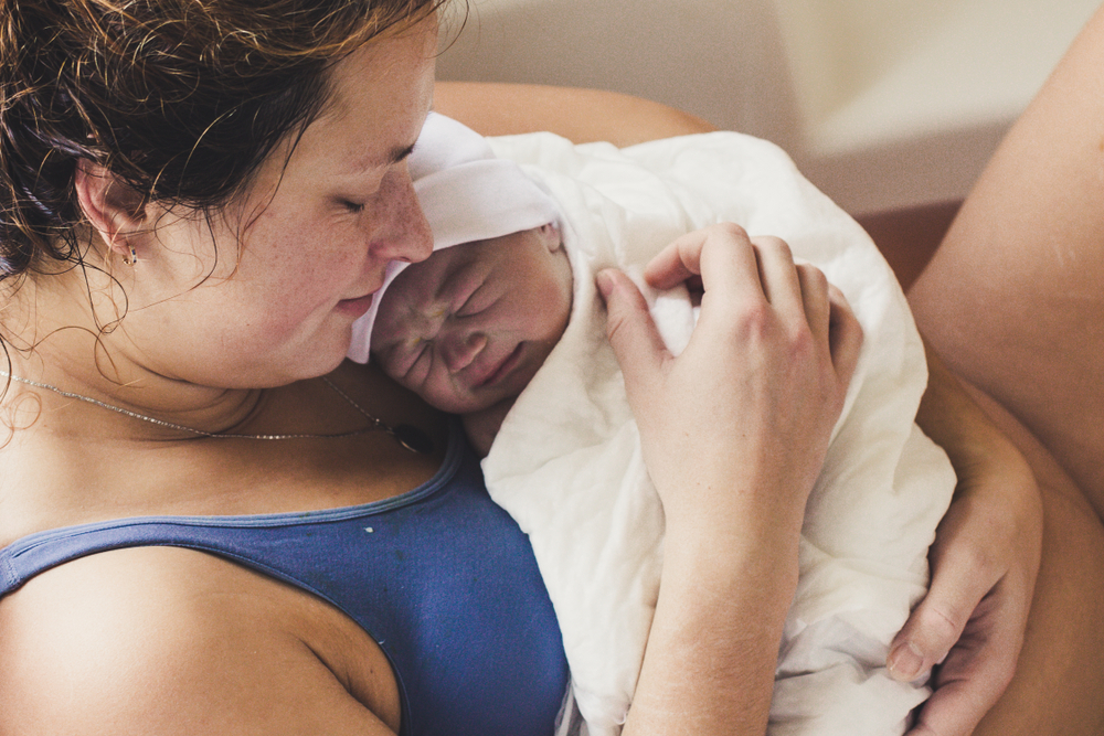 woman holding baby